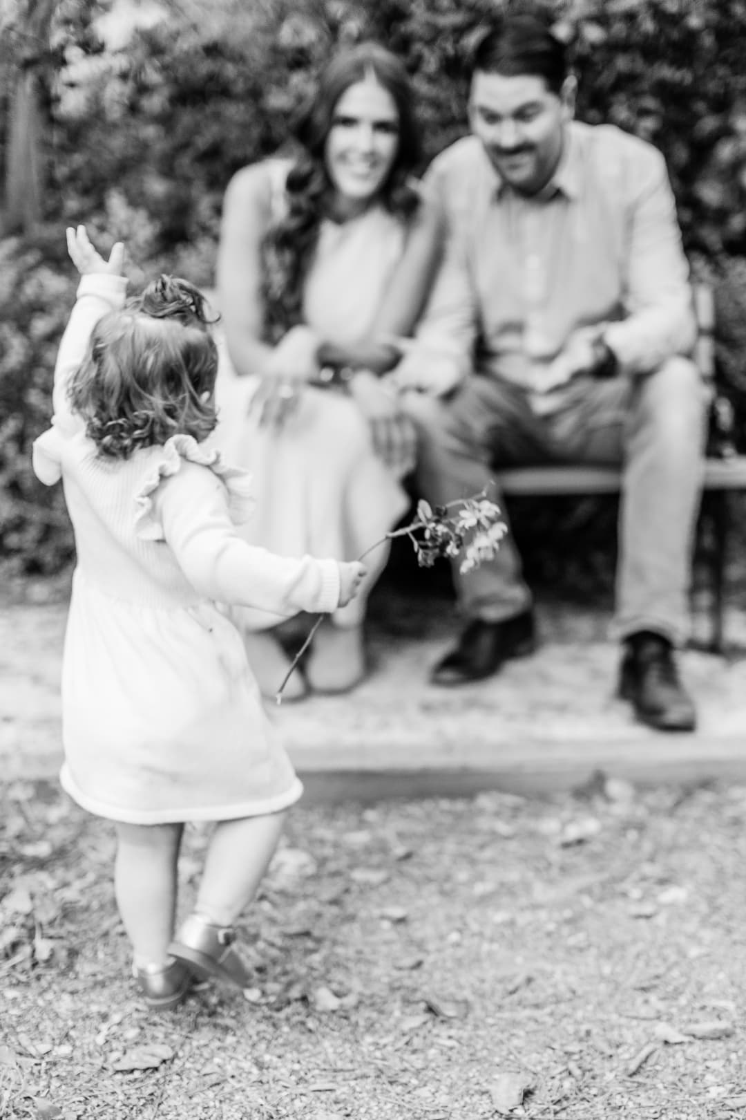 James and Nikki Noell with their daughter, the family behind Ops by Noell, photographed in black and white.